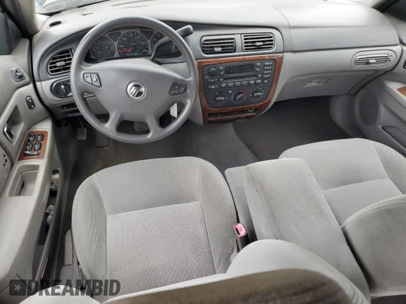 2003 Mercury Sable GS z VIN 1MEFM50U83G602556, wystawiony jako Copart lot #61019515 z przebiegiem 94 998 mil mil oraz Czysty tytuł • Clean title. Historia ofert i sprzedaży dostępna na DreamBid. Obrazek 8.