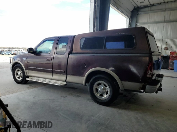2001 Ford F-150 XL with VIN 1FTRX17W71NA45086, listed as a Copart auction lot 54182945 with 173,998 mi miles and Salvage title. Bid and sale history available at DreamBid. Image 2.