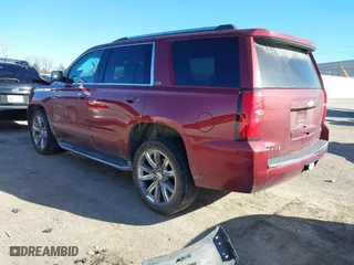 2016 Chevrolet Tahoe LTZ with VIN 1GNSKCKC9GR205745, listed as a IAAI auction lot 41710241 with 94,931 mi miles. Bid and sale history available at carsss.com. Image 3.