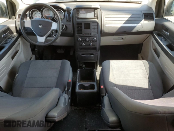 2008 Dodge Grand Caravan SE z VIN 2D8HN44H58R146828, wystawiony jako Copart lot #57417075 z przebiegiem 186 657 mil mil oraz Nie do naprawy • Non repairable. Historia ofert i sprzedaży dostępna na DreamBid. Obrazek 8.