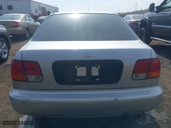 1996 Honda Civic DX with VIN 2HGEJ6627TH550103, listed as a IAAI auction lot 41710877 with 142,608 mi miles. Bid and sale history available at carsss.com. Image 16.