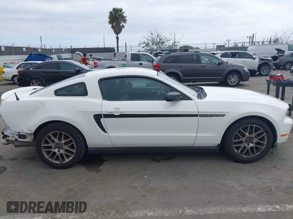 2012 Ford Mustang Premium with VIN 1ZVBP8AM6C5234877, listed as a IAAI auction lot 41911274 with 119,512 mi miles and . Bid and sale history available at DreamBid. Image 14.
