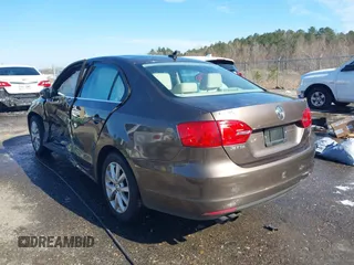 2014 Volkswagen Jetta Sedan SE w/Connectivity with VIN 3VWD07AJ1EM361255, listed as a IAAI auction lot 41385849 with 166,124 mi miles. Bid and sale history available at carsss.com. Image 3.