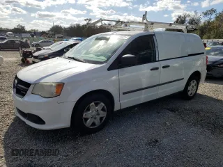 2013 Ram Cargo Van Tradesman with VIN 2C4JRGAGXDR812805, listed as a Copart auction lot 84934214 with 184,209 mi miles and Salvage Title. Bid and sale history available at carsss.com. Image 1.