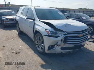 2020 Chevrolet Traverse High Country with VIN 1GNEVNKWXLJ135322, listed as a IAAI auction lot 42042466 with 105,748 mi miles and . Bid and sale history available at DreamBid. Image 1.