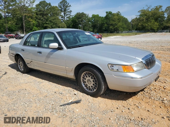 2002 Mercury Grand Marquis GS z VIN 2MEFM74W82X659338, wystawiony jako Copart lot #53887785 z przebiegiem 155 266 mil mil oraz Szkoda całkowita • Salvage title. Historia ofert i sprzedaży dostępna na DreamBid. Obrazek 4.