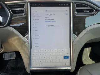 2014 Tesla Model S 60 с VIN 5YJSA1H15EFP49412, выставлен на аукционе Copart как лот 60476835 с пробегом 96 202 миль миль и Списание • Salvage title. История ставок и продаж доступна на DreamBid. Изображение 9.