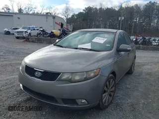 2010 Kia Forte SX with VIN KNAFW4A36A5249266, listed as a IAAI auction lot 41743559 with 215,108 mi miles. Bid and sale history available at carsss.com. Image 2.