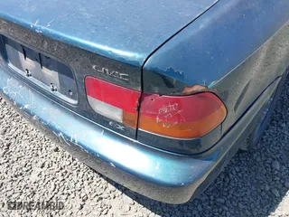 1998 Honda Civic EX with VIN 1HGEJ8145WL032373, listed as a IAAI auction lot 39409076 with 259,197 mi miles. Bid and sale history available at carsss.com. Image 6.