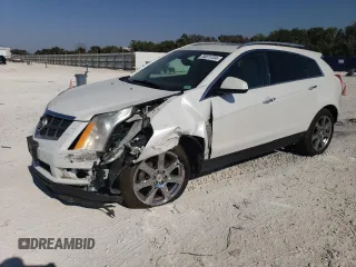 2012 Cadillac SRX Performance Collection with VIN 3GYFNEE33CS659161, listed as a Copart auction lot 76071724 with 149,586 mi miles and Salvage title. Bid and sale history available at DreamBid. Image 1.