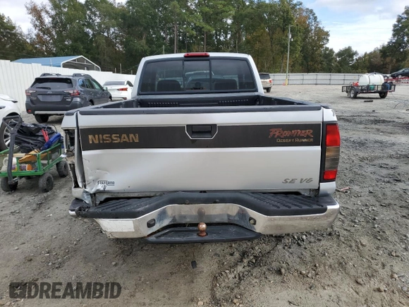 2000 Nissan Frontier XE with VIN 1N6ED26T0YC314102, listed as a Copart auction lot 83678264 with 174,419 mi miles and Salvage title. Bid and sale history available at DreamBid. Image 6.