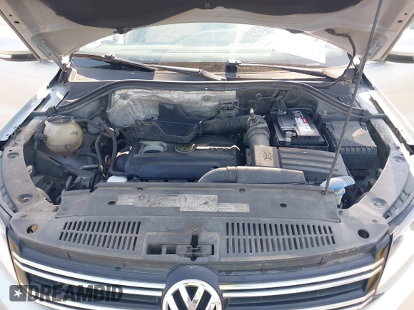 2012 Volkswagen Tiguan SE with VIN WVGAV7AX9CW581957, listed as a IAAI auction lot 42407148 with 135,553 mi miles and . Bid and sale history available at DreamBid. Image 10.
