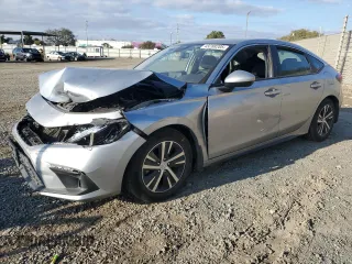 2022 Honda Civic LX z VIN 19XFL2H57NE013811, wystawiony jako Copart lot #43288205 z przebiegiem 96 743 mil mil oraz Szkoda całkowita • Salvage title. Historia ofert i sprzedaży dostępna na DreamBid. Obrazek 1.