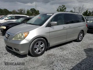 2008 Honda Odyssey Touring z VIN 5FNRL38978B062320, wystawiony jako Copart lot #59898345 z przebiegiem 229 760 mil mil oraz Czysty tytuł • Clean title. Historia ofert i sprzedaży dostępna na DreamBid. Obrazek 1.