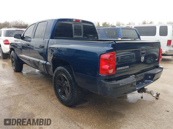 2007 Dodge Dakota SLT with VIN 1D7HE48K07S137252, listed as a IAAI auction lot 41385640 with 223,920 mi miles and . Bid and sale history available at carsss.com. Image 3.