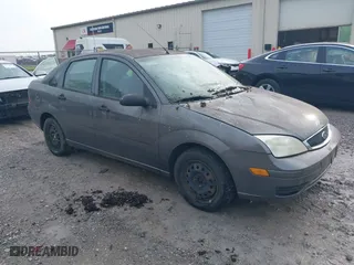2007 Ford Focus S with VIN 1FAFP34N17W212691, listed as a IAAI auction lot 42130099 with 214,101 mi miles. Bid and sale history available at carsss.com. Image 1.