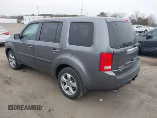 2015 Honda Pilot EX-L with VIN 5FNYF4H57FB035864, listed as a IAAI auction lot 41786445 with 139,787 mi miles and . Bid and sale history available at carsss.com. Image 3.
