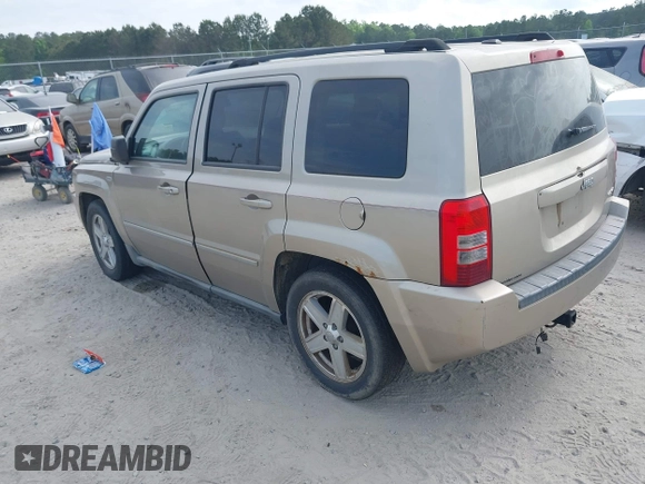 2010 Jeep Patriot Sport with VIN 1J4NF1GB9AD620237, listed as a IAAI auction lot 42079617 with 146,545 mi miles. Bid and sale history available at carsss.com. Image 3.
