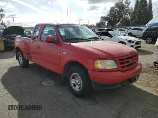 2003 Ford F-150 XL with VIN 1FTRX07213KB93777, listed as a Copart auction lot 46950285 with 176,332 mi miles and Salvage title. Bid and sale history available at DreamBid. Image 4.