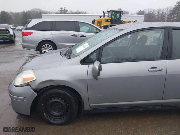 2009 Nissan Versa 1.8 S with VIN 3N1BC13E19L360362, listed as a IAAI auction lot 41864783 with NaN miles. Bid and sale history available at carsss.com. Image 6.