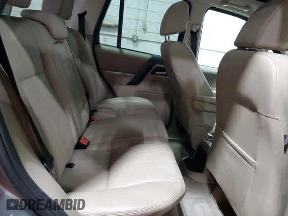 2011 Land Rover LR2 HSE with VIN SALFR2BN0BH257953, listed as a Copart auction lot 52681475 with 162,151 mi miles and Salvage Title. Bid and sale history available at DreamBid. Image 12.