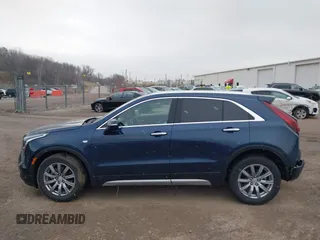 2021 Cadillac XT4 FWD Premium Luxury with VIN 1GYFZCR41MF041306, listed as a IAAI auction lot 41143747 with 53,116 mi miles. Bid and sale history available at carsss.com. Image 14.