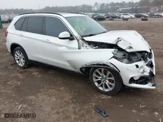 2016 BMW X5 xDrive35i with VIN 5UXKR0C57G0P24296, listed as a IAAI auction lot 41815189 with NaN miles. Bid and sale history available at carsss.com. Image 1.