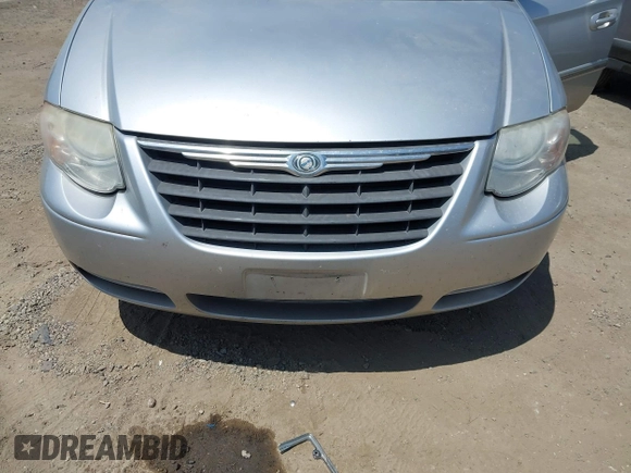 2007 Chrysler Town & Country Touring with VIN 2A8GP54L27R358317, listed as a IAAI auction lot 42492735 with 138,165 mi miles and . Bid and sale history available at DreamBid. Image 6.