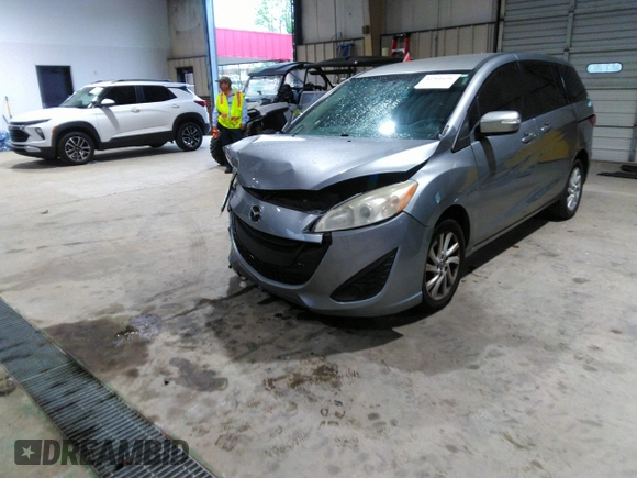 2013 Mazda 5 Sport with VIN JM1CW2BL5D0156684, listed as a IAAI auction lot 41966696 with 121,654 mi miles and . Bid and sale history available at DreamBid. Image 18.