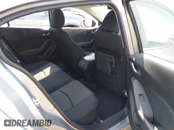 2014 Mazda 3 i Touring with VIN JM1BM1L70E1185972, listed as a IAAI auction lot 42005779 with 90,175 mi miles and . Bid and sale history available at DreamBid. Image 8.