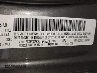 2013 Dodge Journey American Value with VIN 3C4PDCAB2DT645973, listed as a IAAI auction lot 42449402 with 133,000 mi miles and . Bid and sale history available at DreamBid. Image 9.