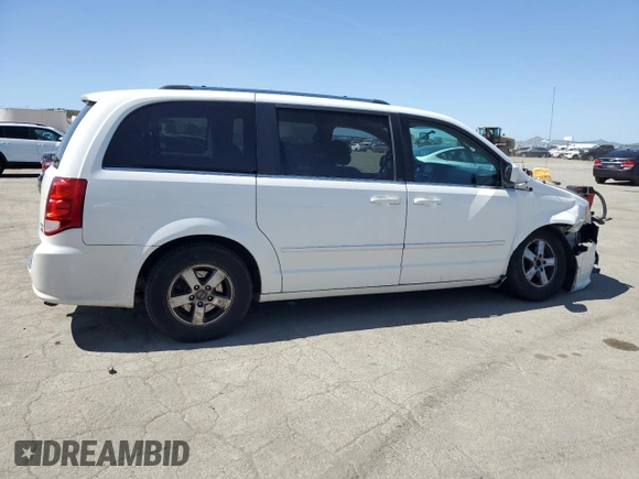 2011 Dodge Grand Caravan Crew with VIN 2D4RN5DG4BR699707, listed as a Copart auction lot 52055425 with 144,904 mi miles and Salvage Title. Bid and sale history available at DreamBid. Image 3.