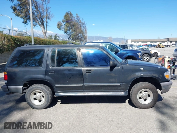 1997 Ford Explorer XL z VIN 1FMDU32E5VUA59508, wystawiony jako IAAI lot #41608736 z przebiegiem 268 377 mil mil oraz . Historia ofert i sprzedaży dostępna na DreamBid. Obrazek 13.