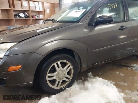 2005 Ford Focus SE with VIN 1FAFP36N45W158796, listed as a IAAI auction lot 41823987 with 145,803 mi miles and . Bid and sale history available at carsss.com. Image 12.