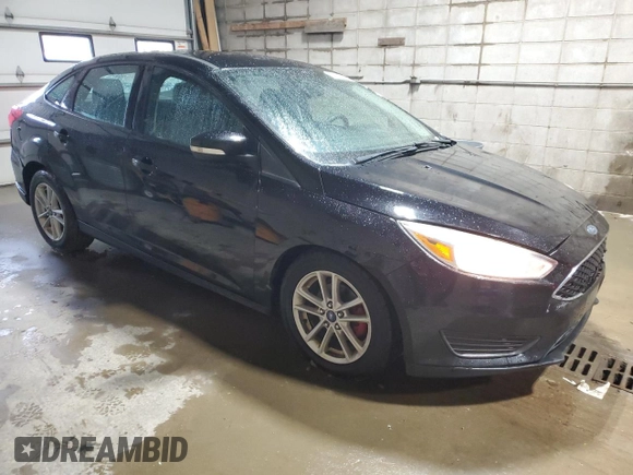 2017 Ford Focus SE with VIN 1FADP3F23HL244667, listed as a Copart auction lot 57597125 with 166,730 mi miles and Salvage title. Bid and sale history available at DreamBid. Image 4.