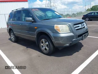 2007 Honda Pilot EX-L with VIN 5FNYF28517B044601, listed as a IAAI auction lot 42737807 with Not provided miles and . Bid and sale history available at DreamBid. Image 1.