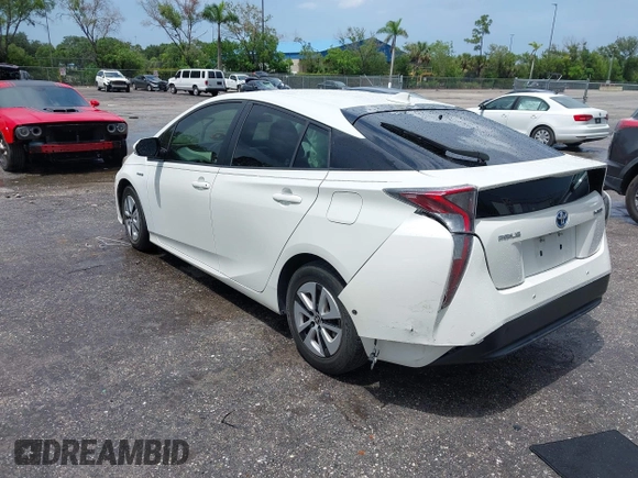 2017 Toyota Prius Two with VIN JTDKBRFU5H3044068, listed as a IAAI auction lot 42462917 with 116,261 mi miles and . Bid and sale history available at DreamBid. Image 3.