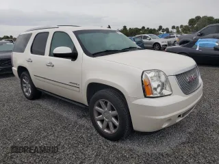 2014 GMC Yukon Denali with VIN 1GKS2EEF0ER102970, listed as a Copart auction lot 73739364 with 125,312 mi miles and Non Repairable. Bid and sale history available at carsss.com. Image 4.
