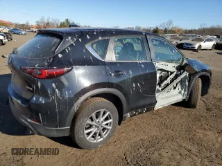 2023 Mazda CX-5 2.5 S with VIN JM3KFBAM4P0224619, listed as a Copart auction lot 88300225 with 32,898 mi miles and Salvage Title. Bid and sale history available at carsss.com. Image 3.