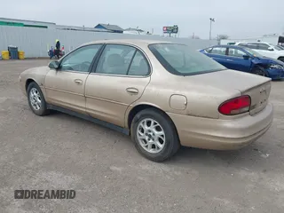 2001 Oldsmobile Intrigue GL z VIN 1G3WS52H51F139480, wystawiony jako IAAI lot #41531828 z przebiegiem 125 650 mil mil oraz . Historia ofert i sprzedaży dostępna na DreamBid. Obrazek 3.