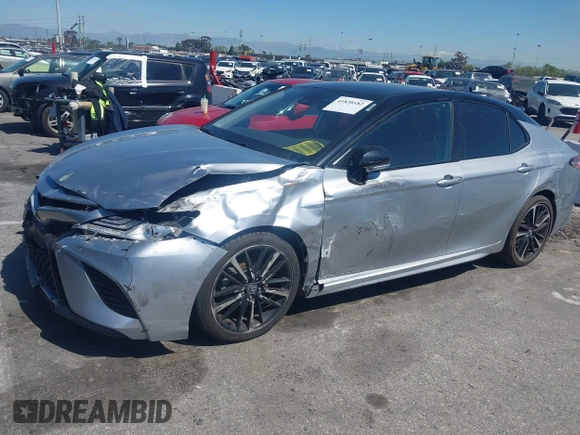 2020 Toyota Camry XSE with VIN 4T1K61AK1LU318098, listed as a IAAI auction lot 41838182 with 64,118 mi miles and . Bid and sale history available at DreamBid. Image 17.