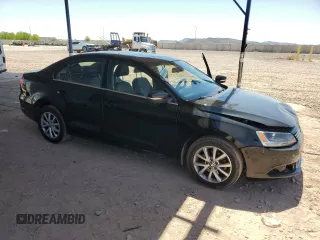 2013 Volkswagen Jetta SE with VIN 3VWDP7AJ1DM354199, listed as a Copart auction lot 61929725 with 149,739 mi miles and Salvage title. Bid and sale history available at DreamBid. Image 4.