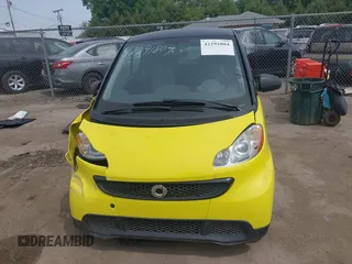 2013 Smart fortwo Pure with VIN WMEEJ3BA5DK663165, listed as a IAAI auction lot 42291804 with 105,074 mi miles and . Bid and sale history available at DreamBid. Image 12.