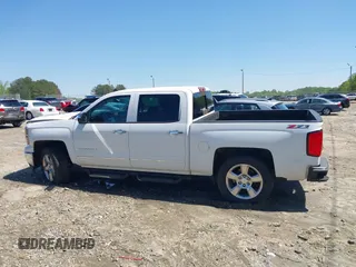 2014 Chevrolet Silverado 1500 LTZ with VIN 3GCUKSECXEG446055, listed as a IAAI auction lot 41988435 with 165,833 mi miles and . Bid and sale history available at DreamBid. Image 15.