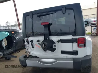2017 Jeep Wrangler Unlimited Sahara with VIN 1C4HJWEG0HL595144, listed as a IAAI auction lot 41644511 with 143,512 mi miles. Bid and sale history available at carsss.com. Image 17.