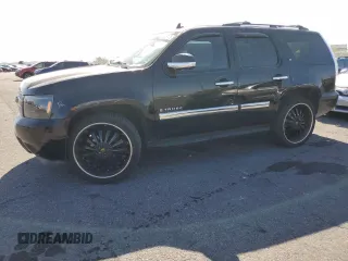 2007 Chevrolet Tahoe LT z VIN 1GNFC13027R406443, wystawiony jako Copart lot #57829125 z przebiegiem 206 273 mil mil oraz Szkoda całkowita • Salvage title. Historia ofert i sprzedaży dostępna na DreamBid. Obrazek 1.