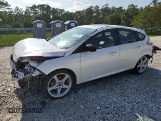 2014 Ford Focus Titanium with VIN 1FADP3N27EL161613, listed as a Copart auction lot 56166805 with 140,336 mi miles and Salvage title. Bid and sale history available at DreamBid. Image 1.