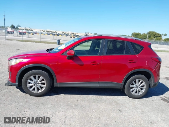 2015 Mazda CX-5 Touring with VIN JM3KE2CY5F0542184, listed as a IAAI auction lot 41770264 with 119,592 mi miles. Bid and sale history available at carsss.com. Image 14.