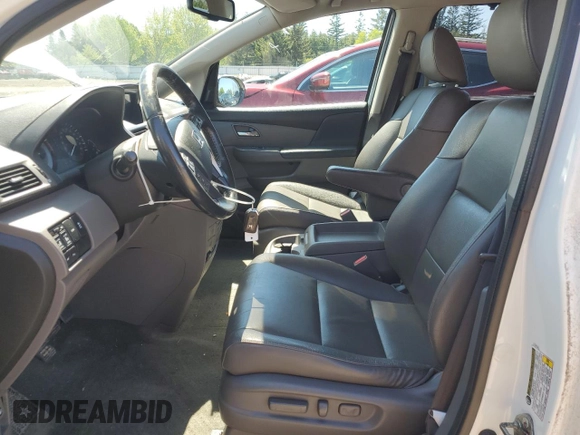 2015 Honda Odyssey Touring Elite with VIN 5FNRL5H92FB504977, listed as a Copart auction lot 56657195 with 189,438 mi miles and Salvage title. Bid and sale history available at DreamBid. Image 7.