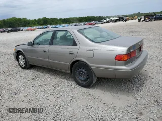 2001 Toyota Camry CE z VIN 4T1BG22KX1U085868, wystawiony jako Copart lot #58100375 z przebiegiem 122 886 mil mil oraz Szkoda całkowita • Salvage title. Historia ofert i sprzedaży dostępna na DreamBid. Obrazek 2.